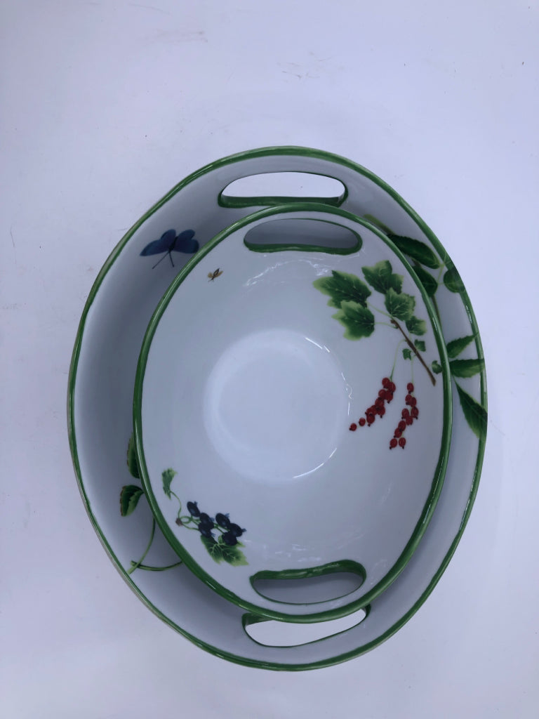 2 NESTING BOWLS W/FRUITS INSECTS WHITE GREEN RIM W/ HANDS.