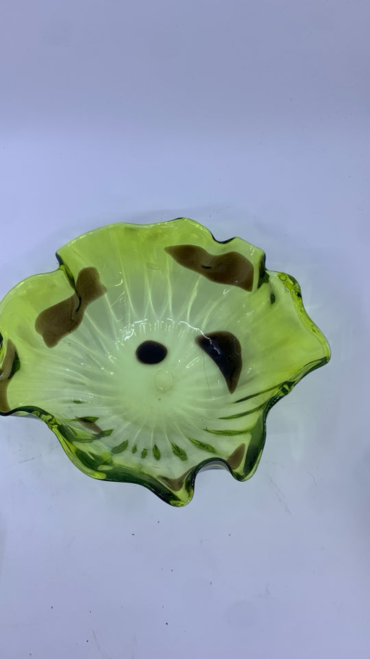 BLOWN LIGHT GREEN GLASS BOWL W/ DARK BROWN SPOTS UNEVEN EDGE.