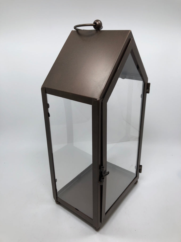 BRONZE PAINTED CANDLE LANTERN.