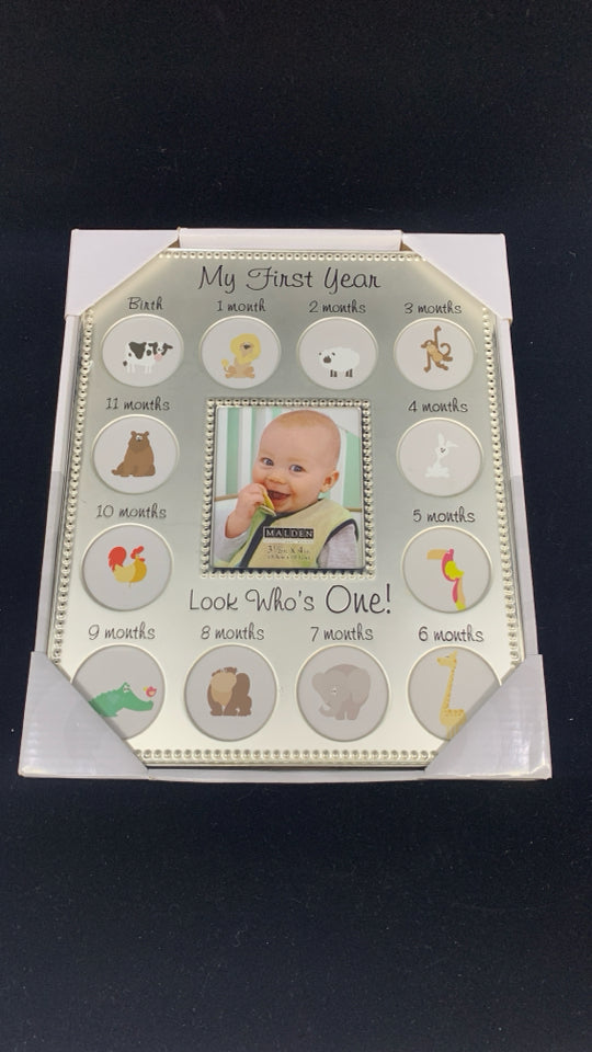 MY FIRST YEARS SILVER PHOTO FRAME.