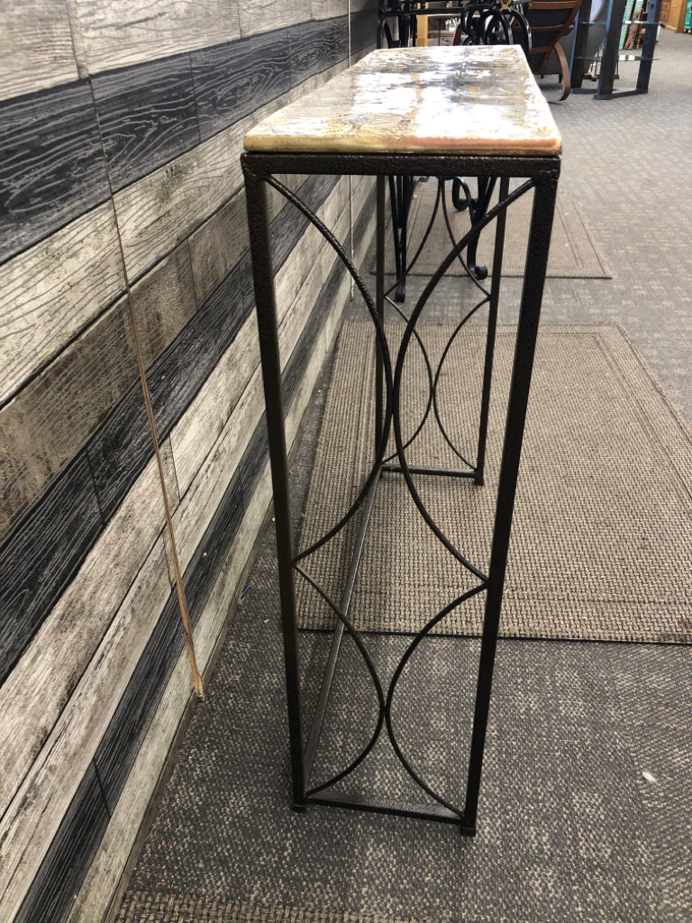 NARROW TABLE W/ GOLD ETCHED CERAMIC TOP & METAL SIDES.