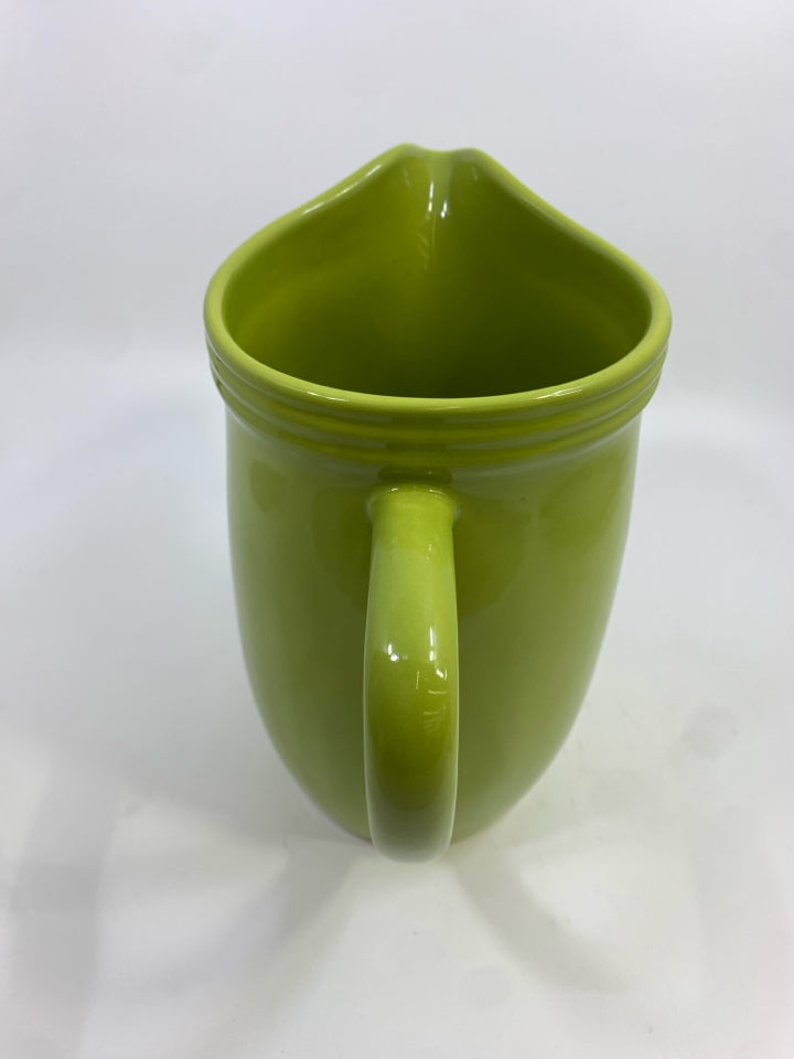 OLIVE GREEN STONEWARE PITCHER.