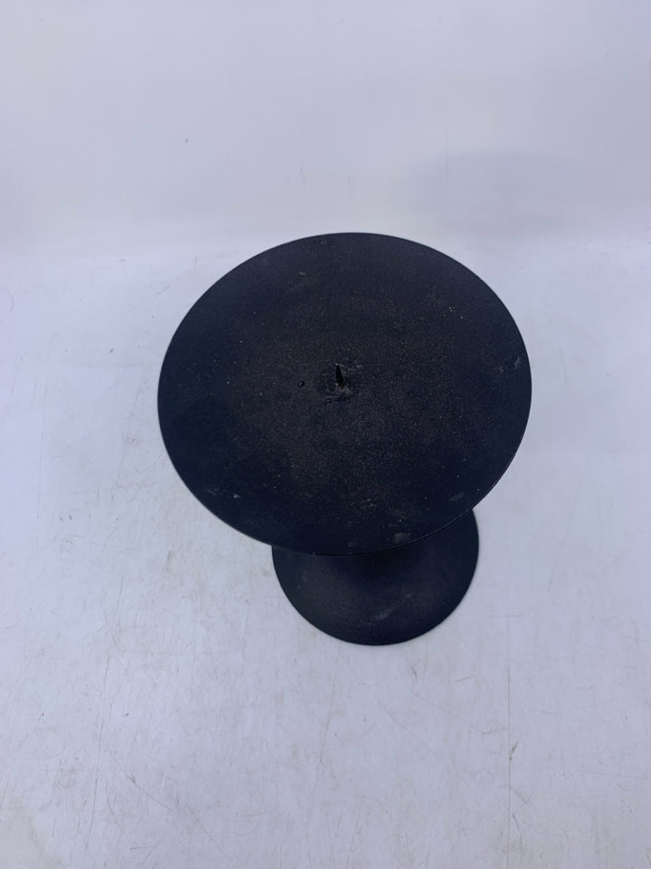 BLACK SCROLL METAL PILLAR CANDLE HOLDER.