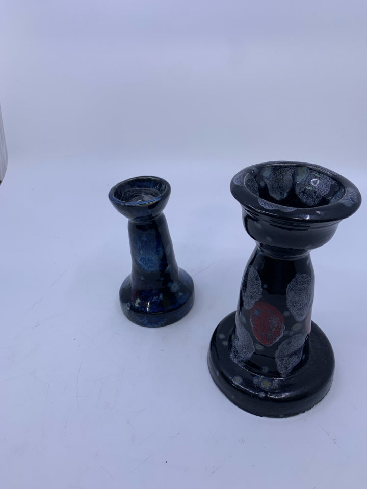 2PC POTTERY CANDLE HOLDER SET.