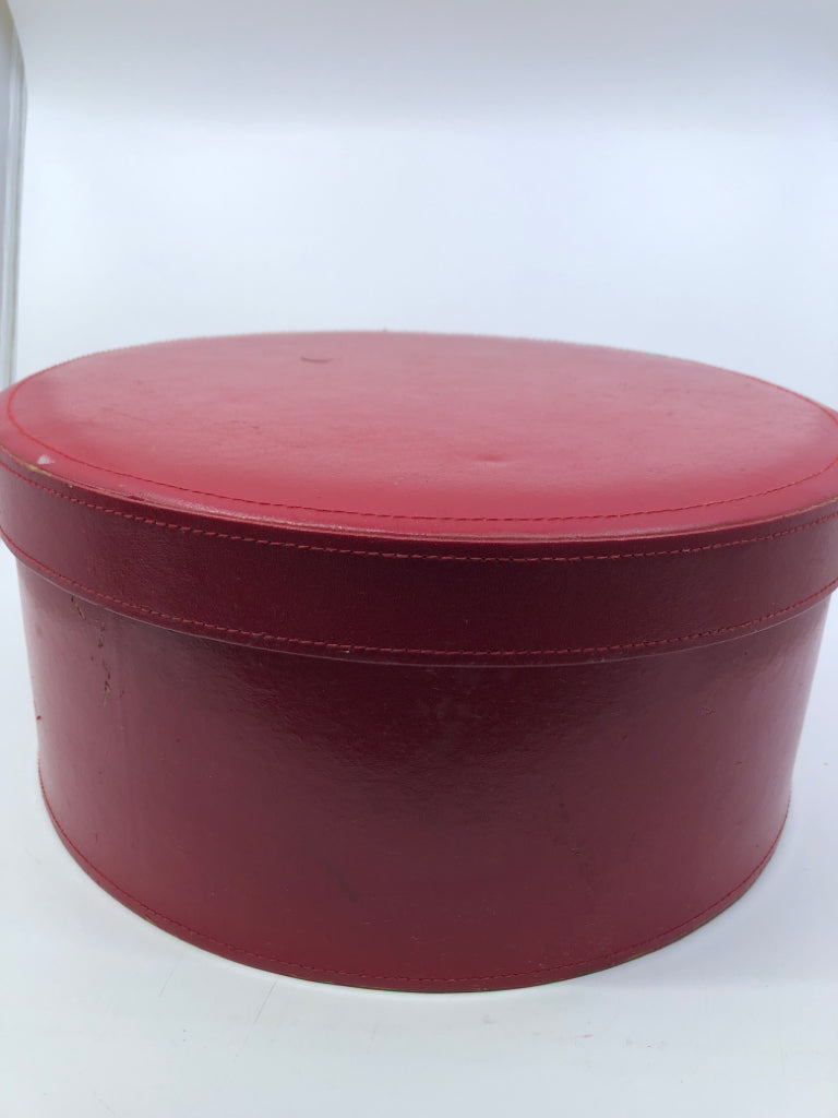 RED BONDED LEATHER HAT BOX.