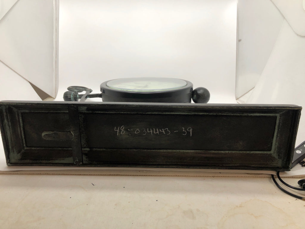 BRUSHED METAL SCROLL SHELF CLOCK.