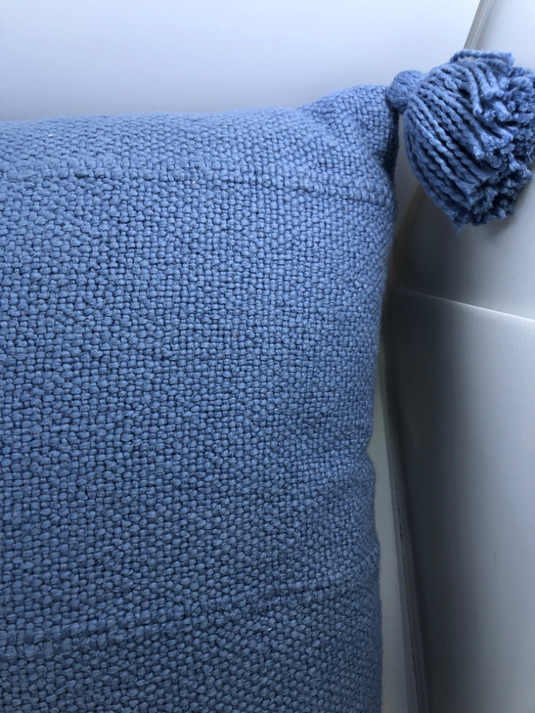 LT BLUE PILLOW W/TASSLES.