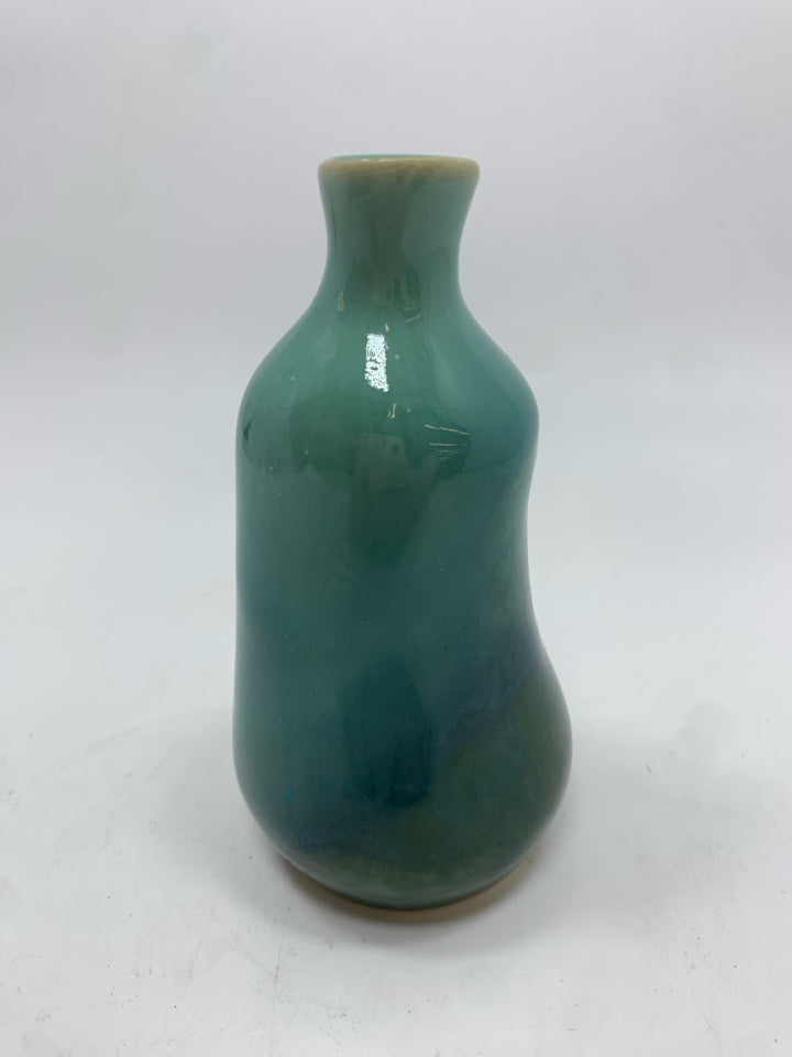 LT BLUE GLAZED BUD VASE.