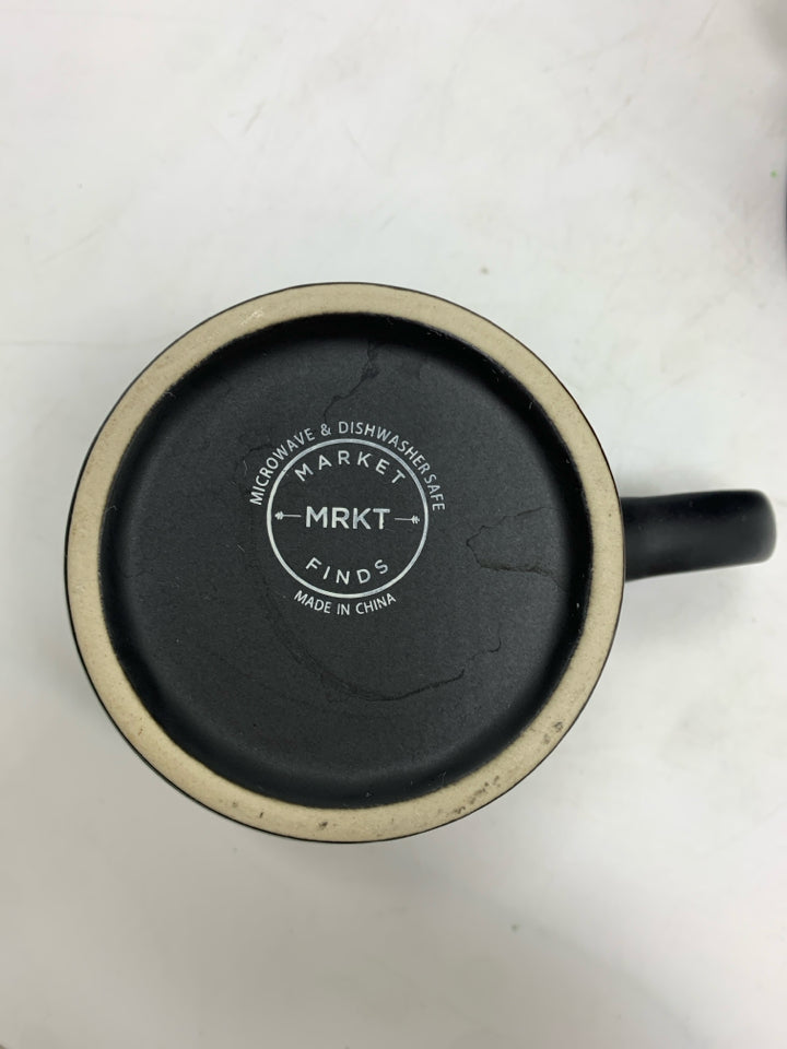 4 BLACK COFFEE MUGS IN STAND.