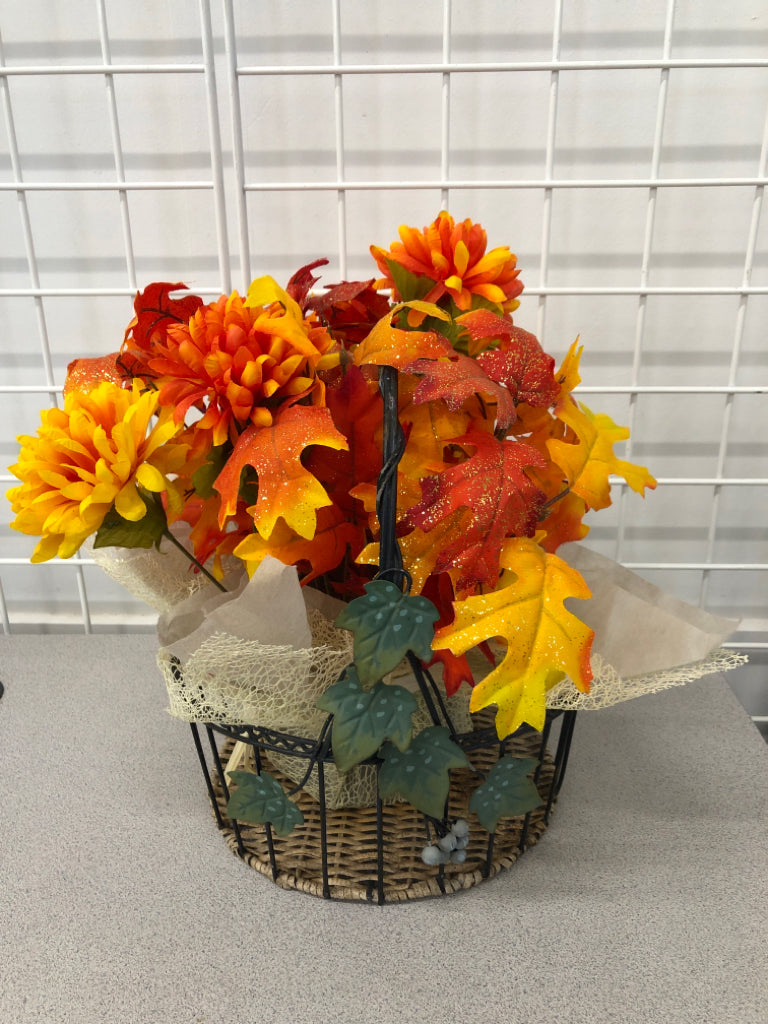 GLITTER LEAF BOUQUET IN WIRE BASKET.