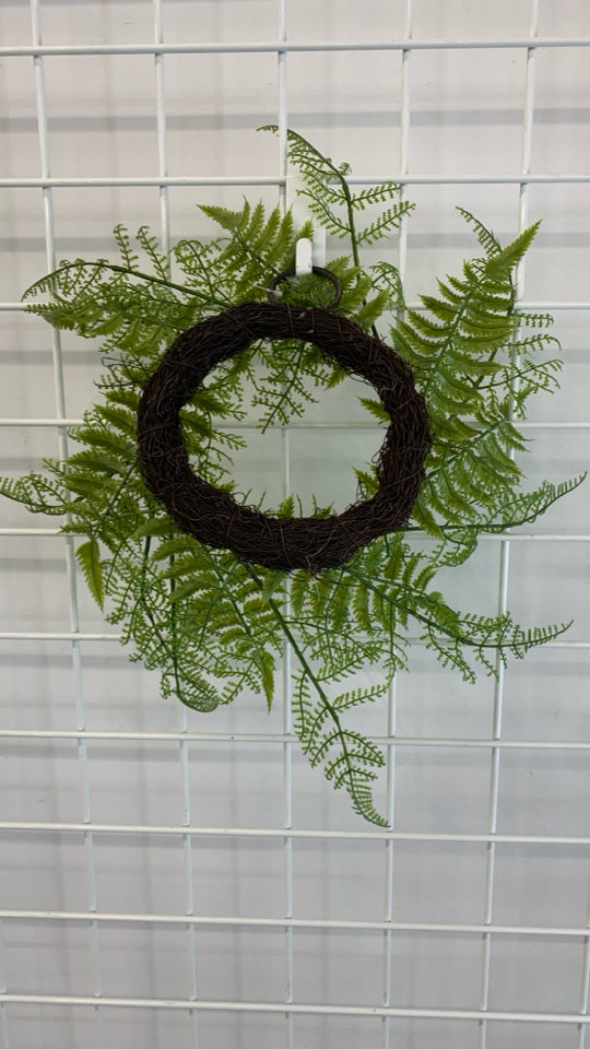 FAUX FERN WREATH W/TWIG DESIGN.