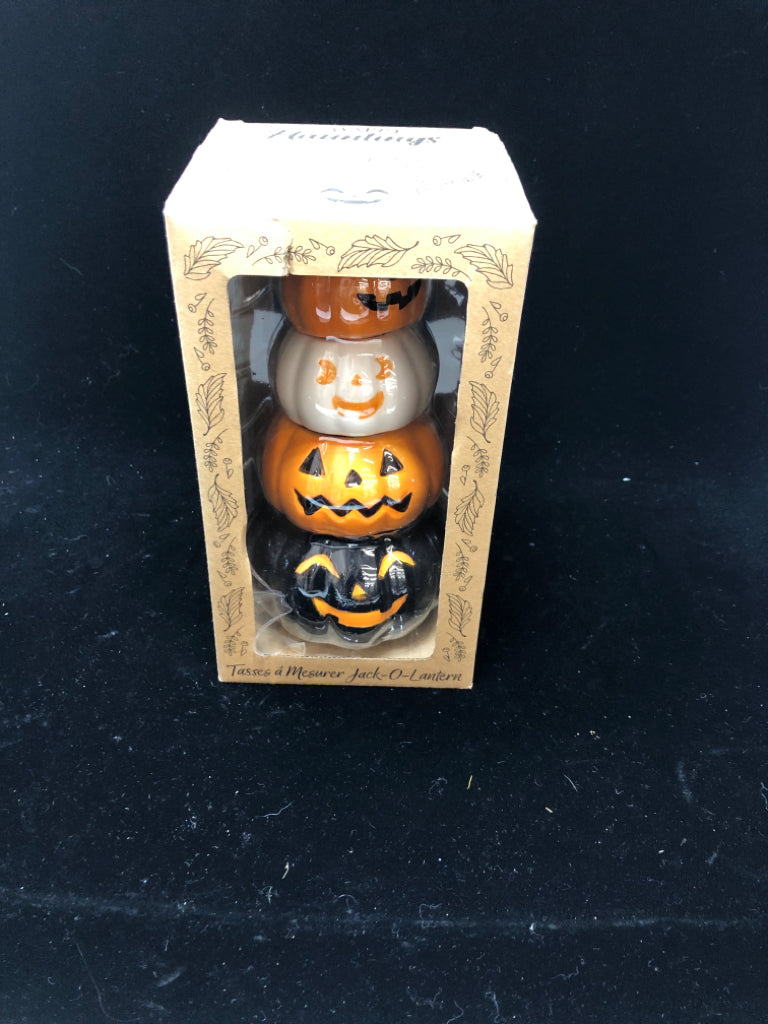 NIB JACK-O-LANTERN MEASURING CUPS.