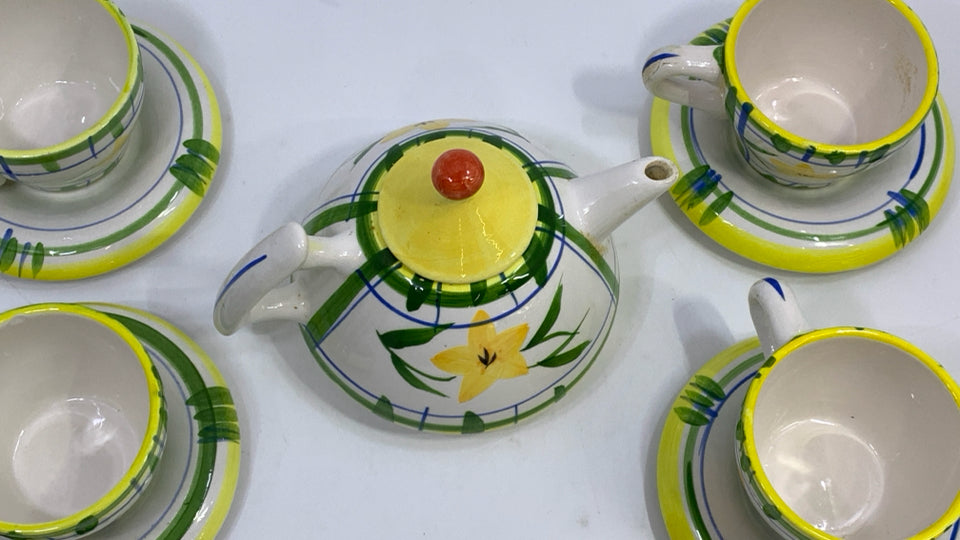9PC YELLOW FLOWER/GREEN STRIPE TEAPOT AND CUP SET.