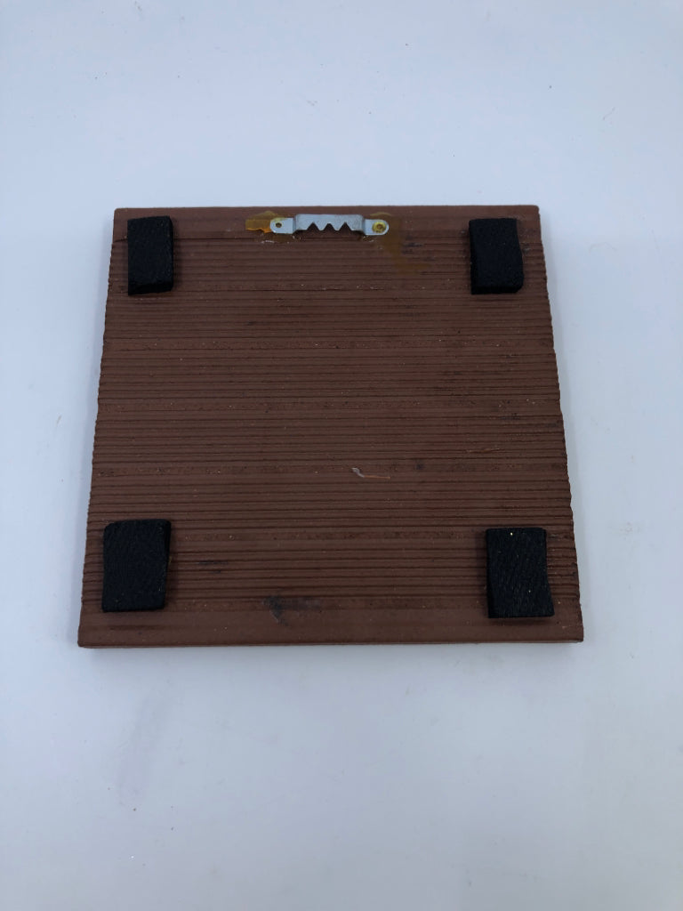 RED GLAZED TERRA COTTA SQUARE TRIVET.