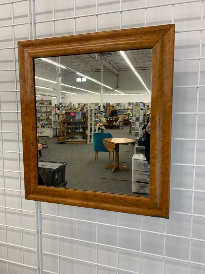 BROWN RUSTIC FRAMED MIRROR.