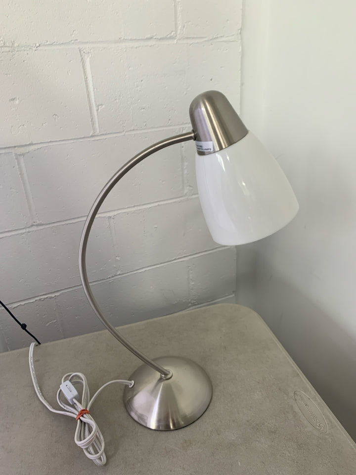 STAINLESS STEEL CURVED BASE LAMP W/ WHITE PLASTIC SHADE.
