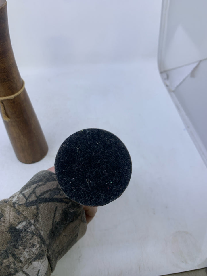 2 DARK WOOD TAPERED CANDLE HOLDERS.