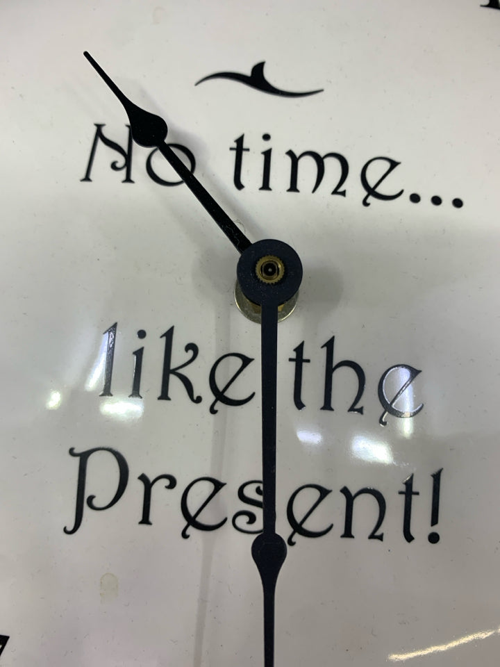 WHITE CLOCK NO TIME LIKE THE PRESENT.