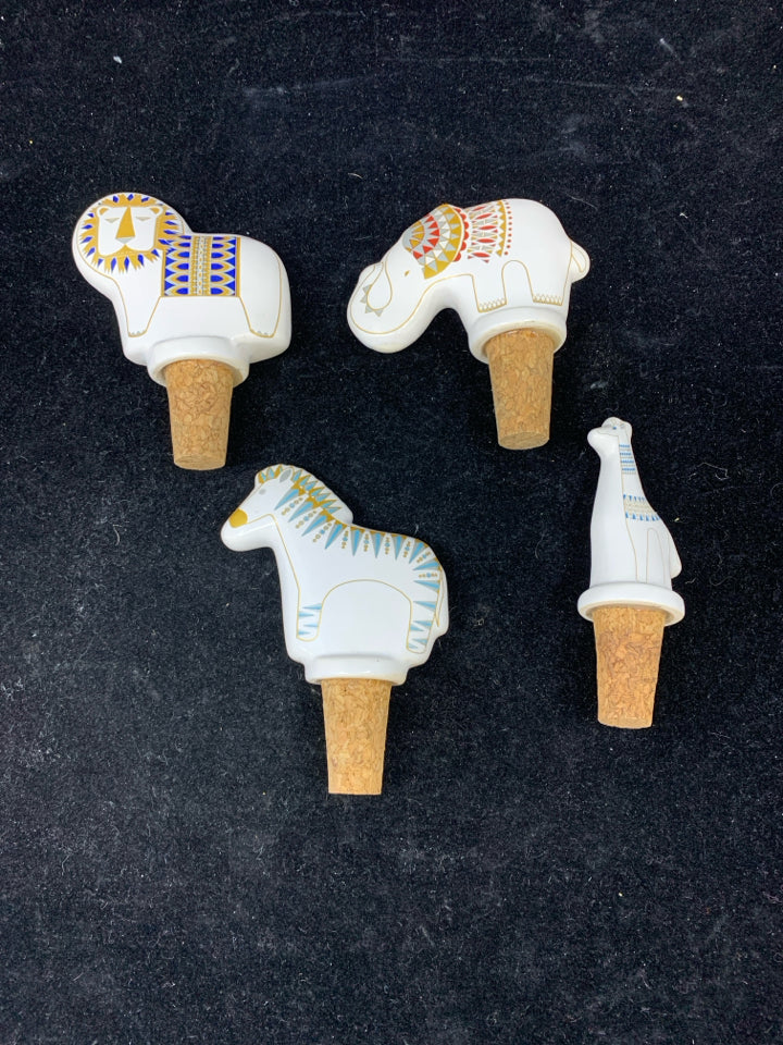 4 CERAMIC ANIMALS WINE STOPPERS.