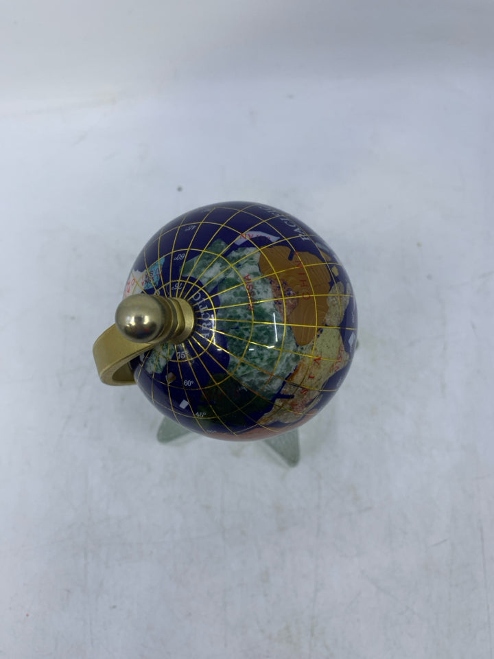 SMALL GLOBE ON STAR GLASS STAND.