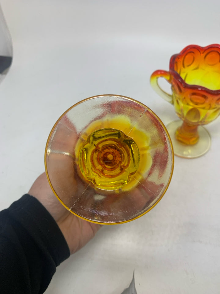 VTG 2 PC FOOTED AMBERINA SUGAR/CREAMER W/ SCALLOP EDGE.