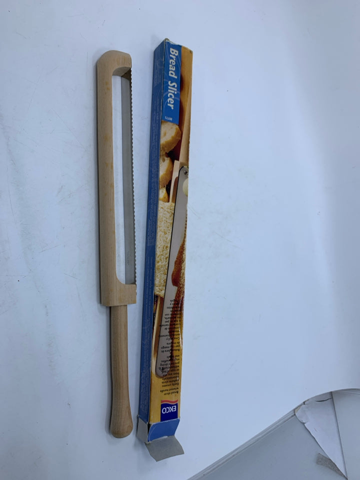 NIB EKCO BREAD SLICER.