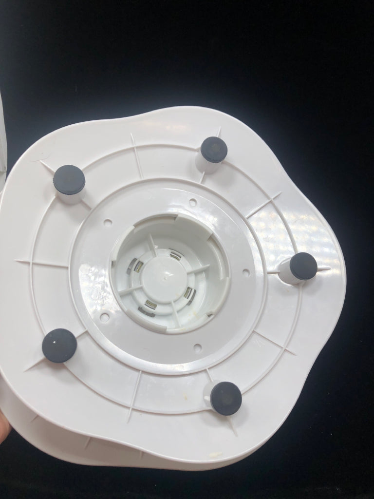 WHITE ROTATING CAKE-STAND.