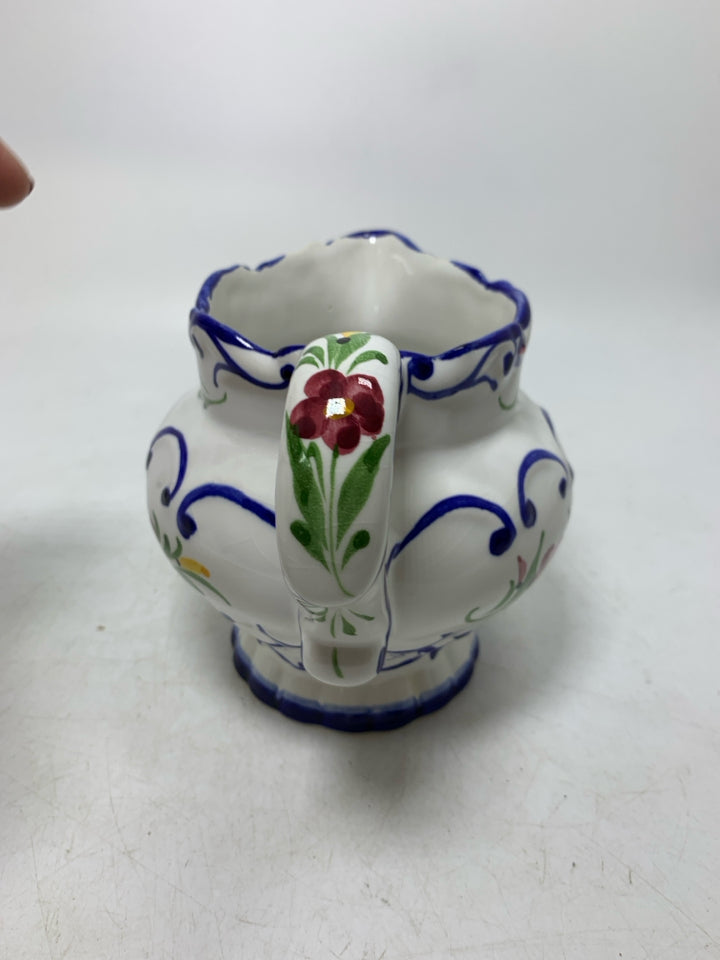 BLUE EDGES W/ FLORAL PITCHER MADE IN PORTUGAL.