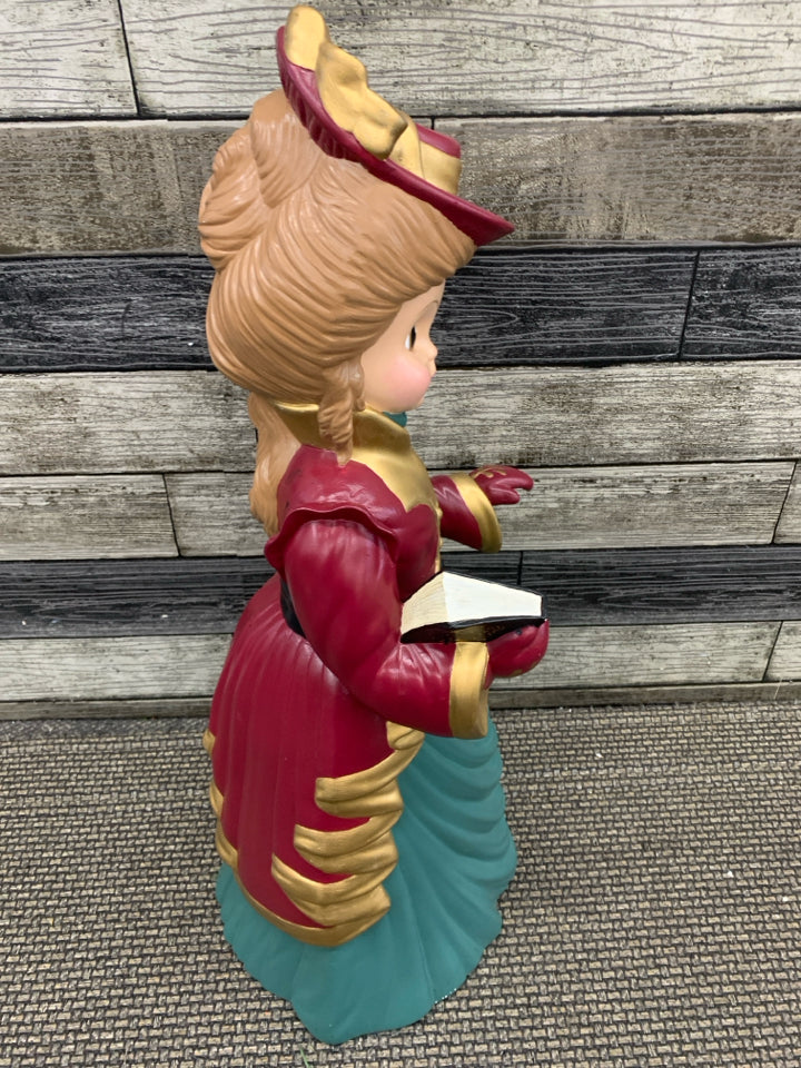 VTG LARGE WOMAN CAROLER FIGURE.