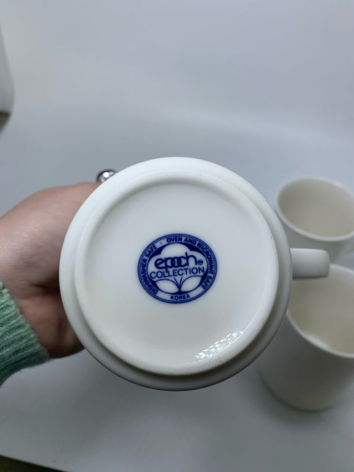 4 WHITE MUGS.