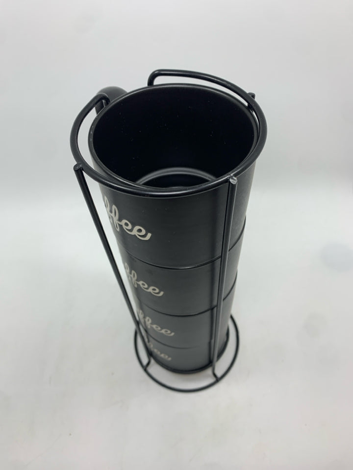 4 BLACK COFFEE MUGS IN STAND.
