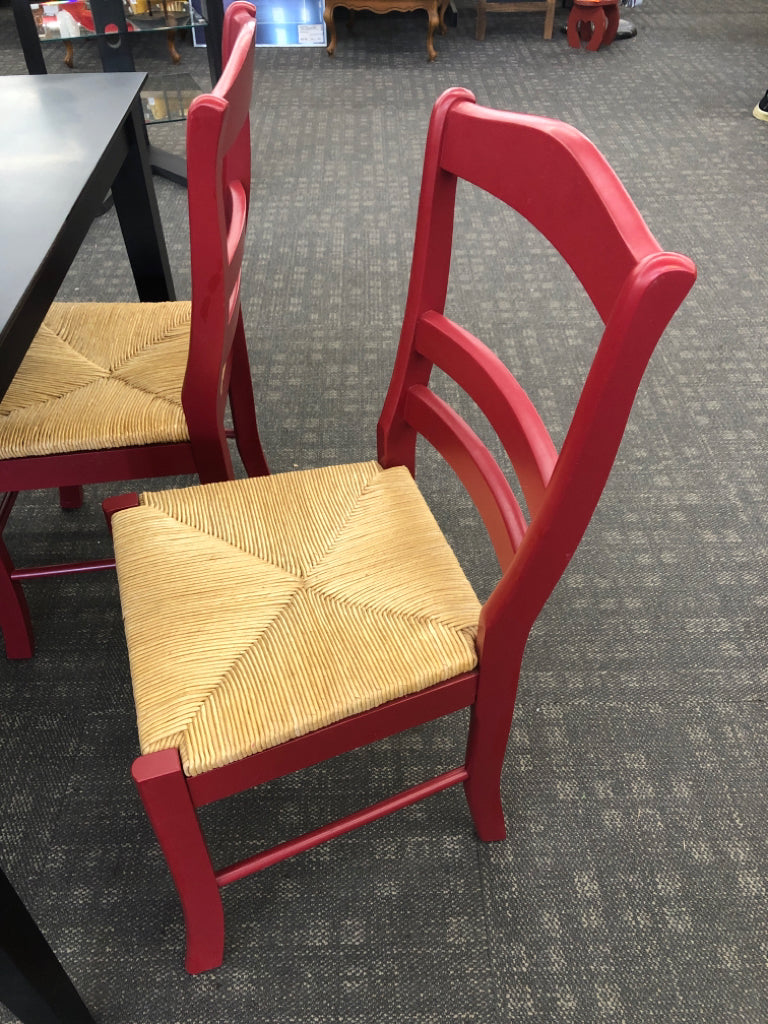 BLACK CONTEMPORARY TABLE & 4 RED CHAIRS W/WICKER SEAT.