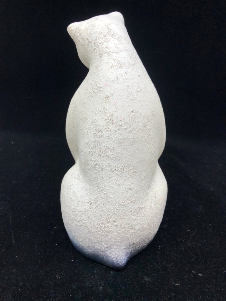 TALL SITTING POLAR BEAR.