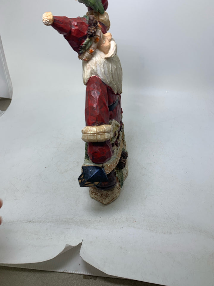 RESIN SANTA HOLDING LANTERN W/ BIRDS/BIRD HOUSES ON SUIT.