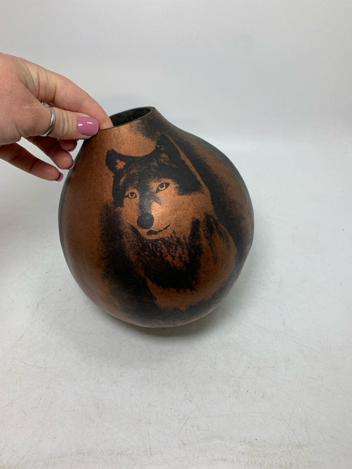CARVED GOURD W/ METALLIC PAINTED WOLF.