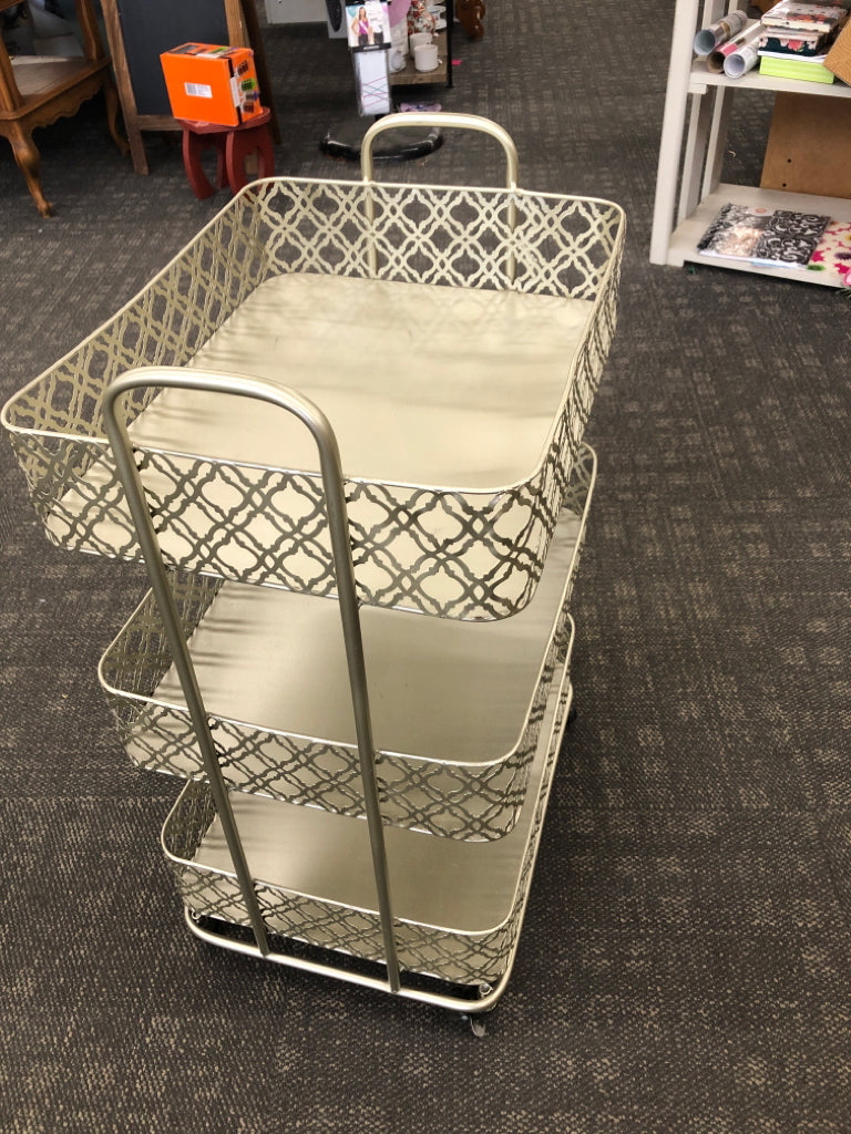 GOLD METAL 3 TIER STORAGE CART ON WHEELS.