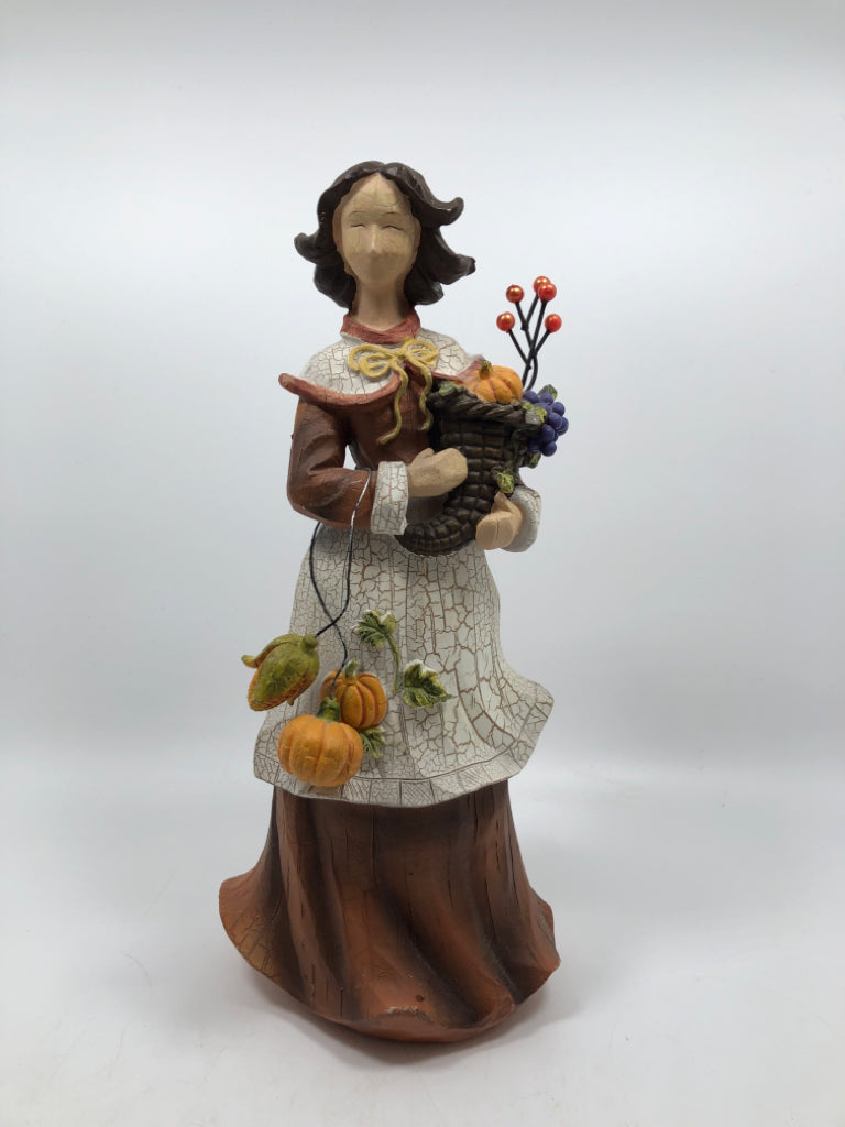 WOMAN HOLDING CORNUCOPIA "YOUNG" FIGURINE.