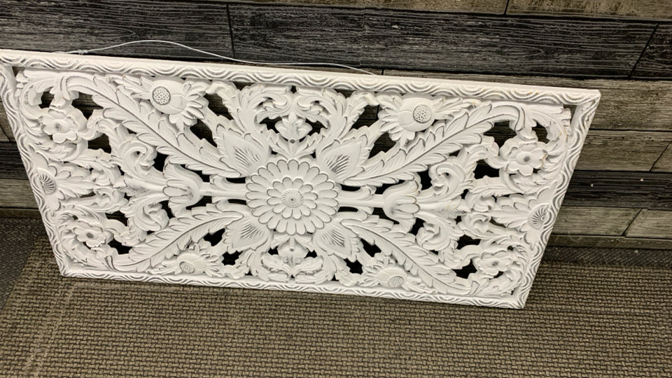 DISTRESSED WHITE CARVED WOODEN FLORAL PANEL.