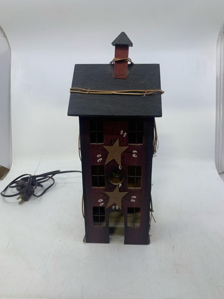 MAROON PRIMITIVE STYLE HOUSE W/ VINES/STARS.