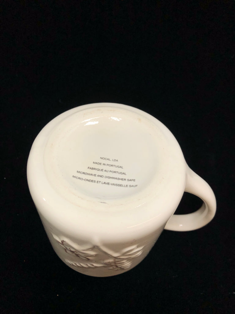 DISTRESSED-STYLE FLORAL CERAMIC MUG.