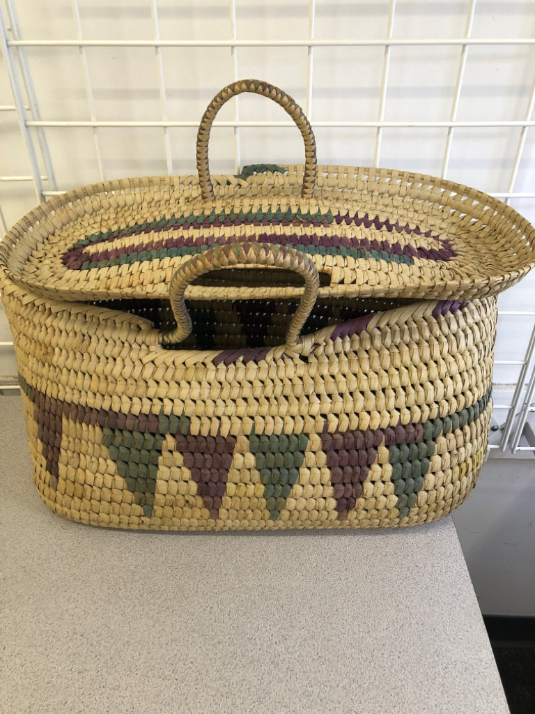 LIGHT BROWN WOVEN BASKET W/ LID & HANDLES TEAL/PURPLE TRIANGLES.