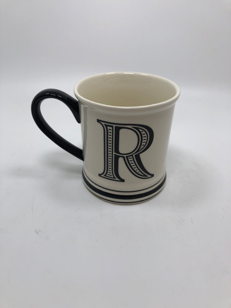 R COFFEE MUG W/BLACK HANDLE.