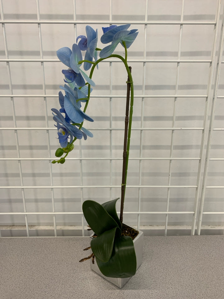 FAUX BLUE ORCHID IN SILVER POT.