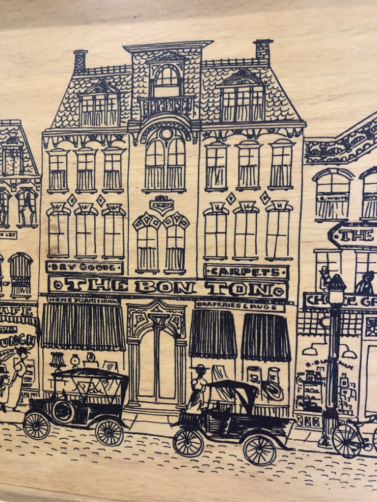 VTG WOOD WALL ART W/ TOWN ILLUSTRATION.