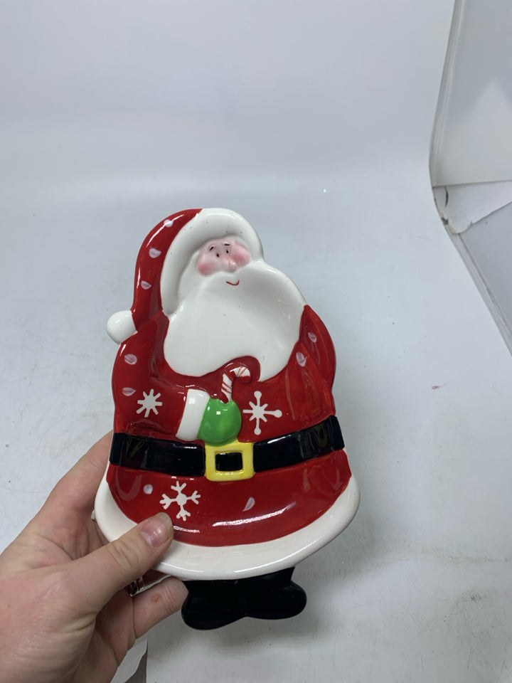 SANTA HOLDING A CANDY CANE CATCH ALL BOWL.