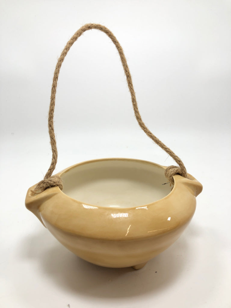 BROWN HANGING POTTER PLANTER.