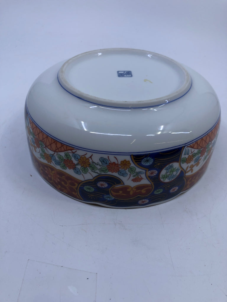 DARK BLUE RED DETAILED SERVING BOWL W/ ASSORTED FLOWER BOUQUET IN CENTER.