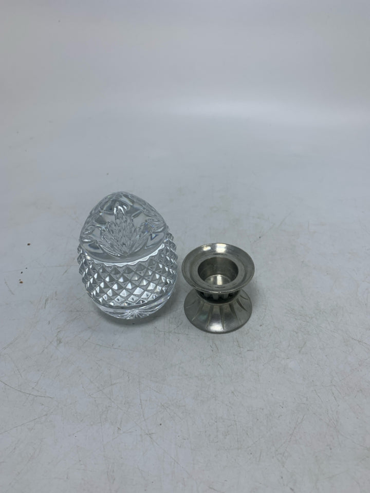 HEAVY GLASS TEXTURE EGG ON METAL STAND.