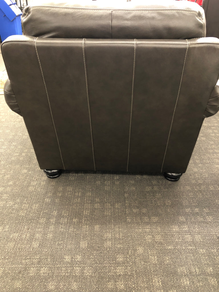 LEATHER LOUNGE CHAIR + OTTOMAN.