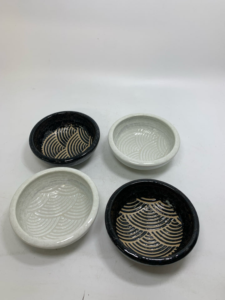 4 BLACK & WHITE BERRY BOWLS W/ DETAILED LINED BOTTOMS.
